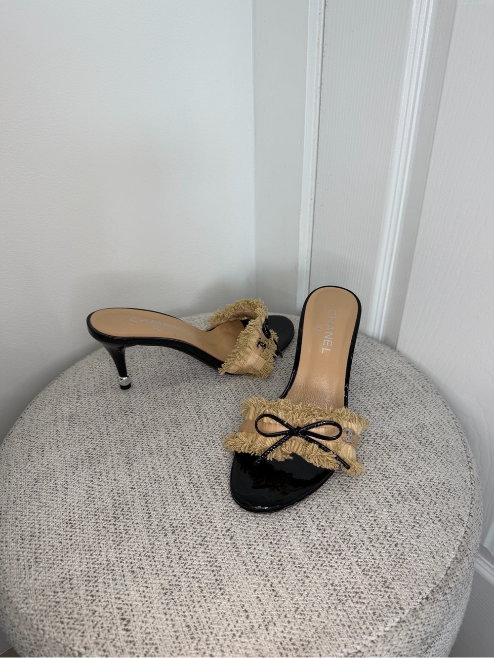 CHANEL Black Patent Mules with Beige Fringe Bow